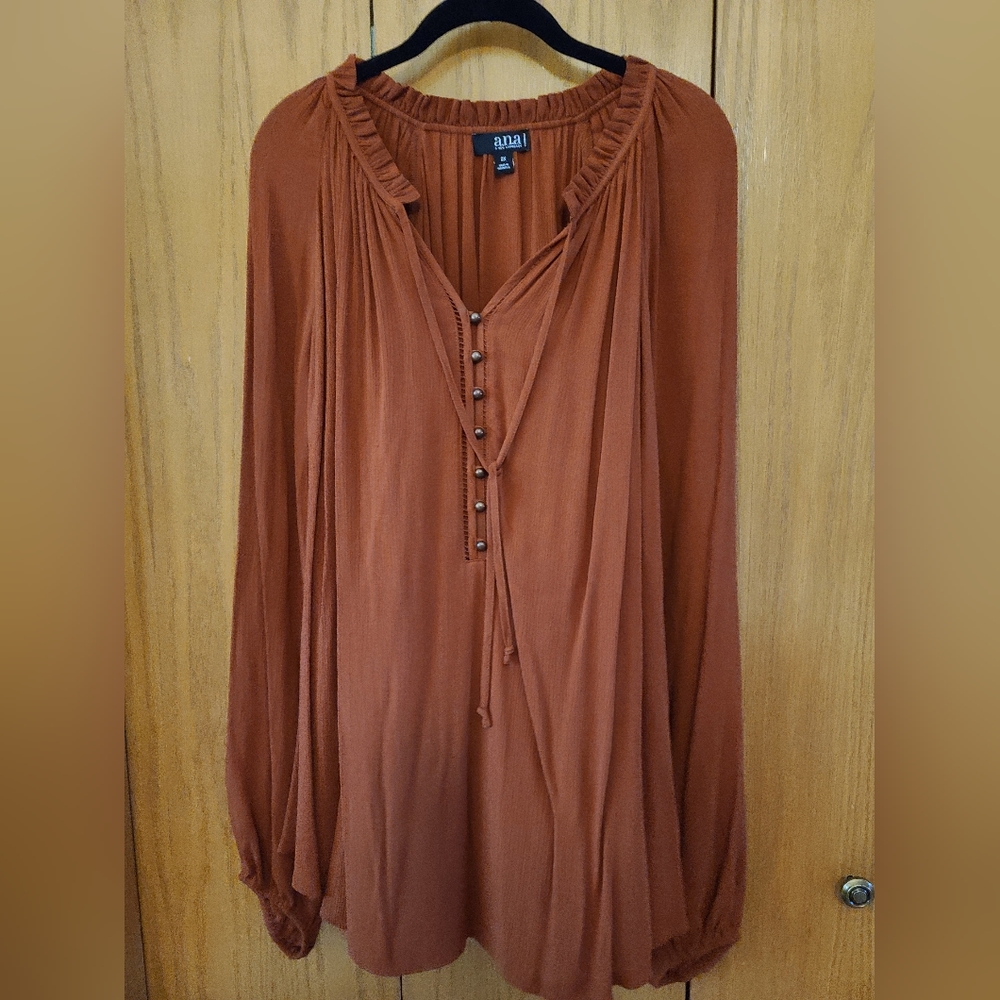 Plus size blouse with boho feel.